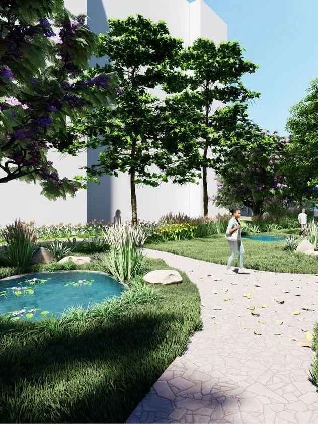 A winding nature walk under flowering trees, past a small pond